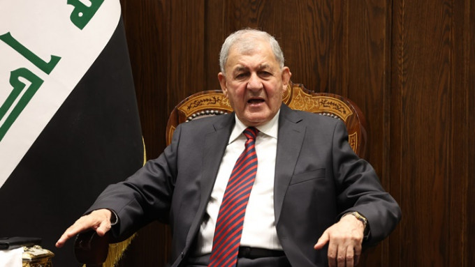 伊拉克國會選出前部長拉希德就任總統，結束長達一年的政治僵局。新華社圖片
