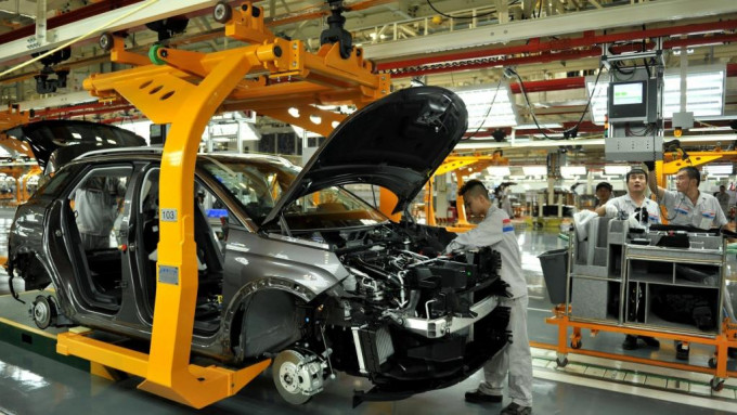 辛国斌提到，上海及广东汽车企业已恢复正常生产。资料图片