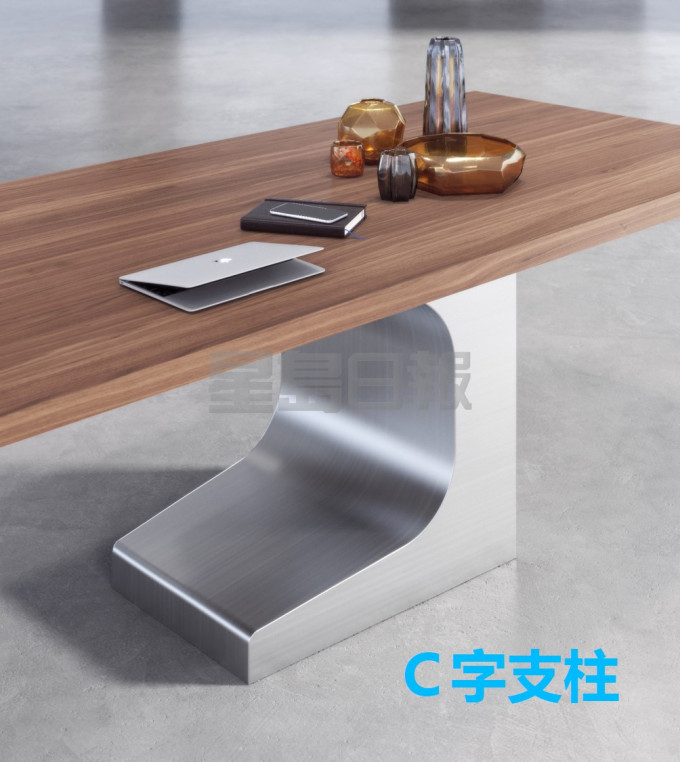 特意为家庭和办公室而设的Niemeyer Table来自意大利品牌ESTEL，它单靠一支呈「C」形的支柱，以不锈钢包裹着木材，再配有内部配重板，桌面下方还设有抽屉和充电口，为开会做好准备。