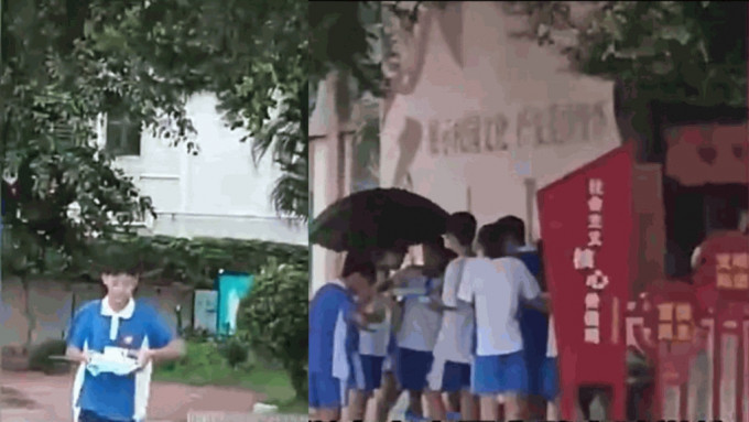 家长拍片指控深圳金碧实验学校将学生赶出操场淋雨食饭。