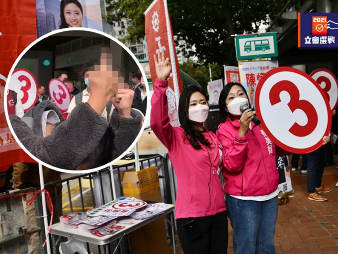 新界西南候选人、工联会的陈颖欣（左）到葵涌广场外拉票，期间有市民做出粗口手势。