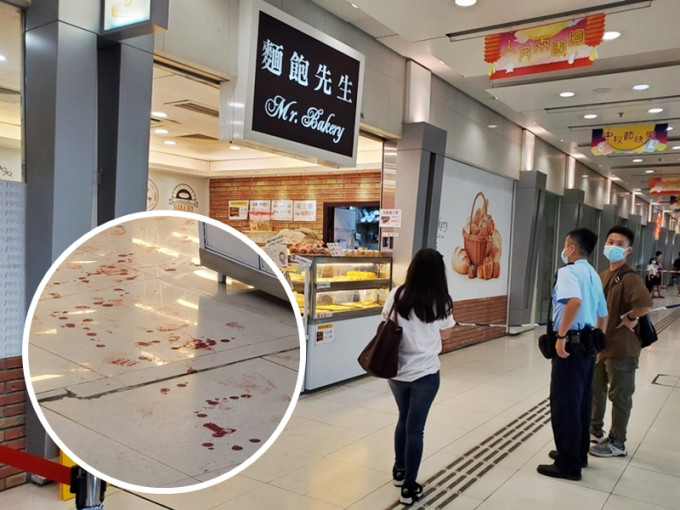 3名面包店职员被人持刀袭击受伤，地上留有血迹。