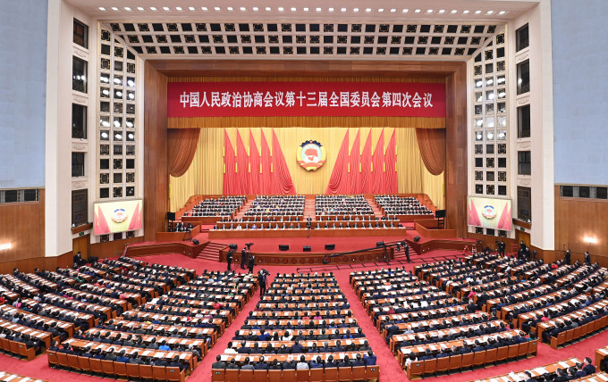 全国政协会议下午在北京人民大会堂闭幕。新华社图片