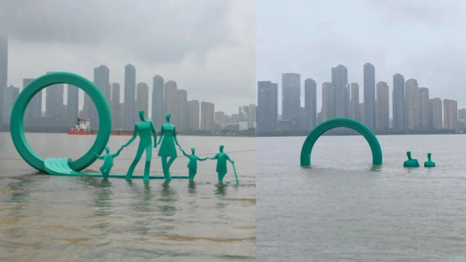 湖北武汉暴雨成灾，江滩的「五口之家」雕塑几被洪水淹没。