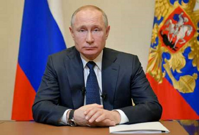 俄羅斯總統府有職員確診，與普京無直接接觸。AP資料圖片