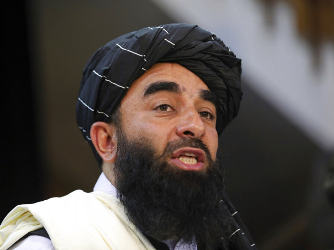 塔利班新聞發言人穆賈希德表示不想與國際社會作對。AP