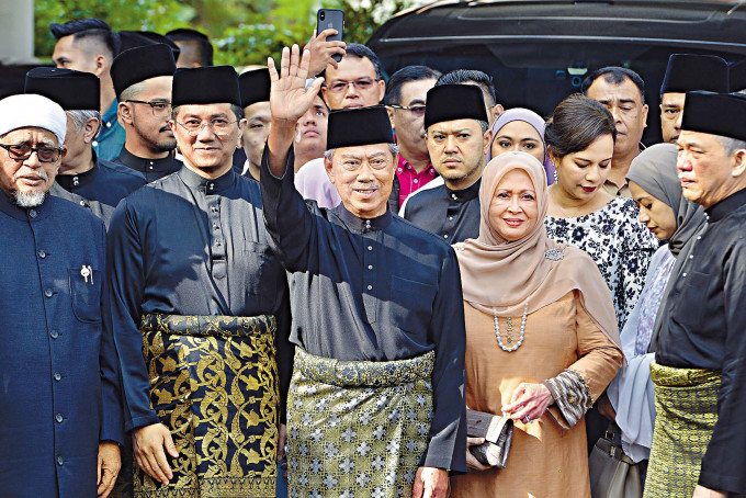 马来西亚首相毛希丁(中)。AP资料图片