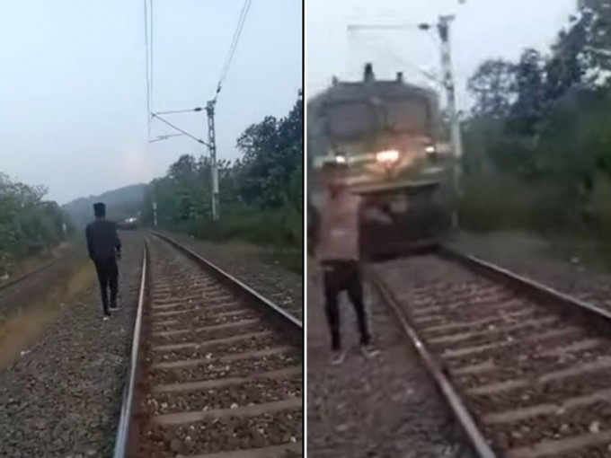 印度男開直播站路軌旁背向駛近火車擺拍，遭撞死。youtube截圖