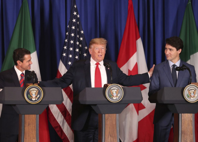 美國、墨西哥和加拿大昨日(30日)簽署全新的貿易協定。AP