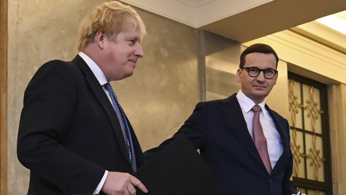 英国首相到访波兰，与波兰总理莫拉维茨基会谈，就俄乌紧张局势进行磋商。AP图
