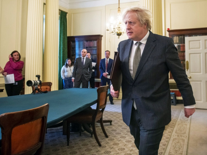 英國《衛報》報道，首相約翰遜正尋求加強與中方恢復經濟對話。AP圖片