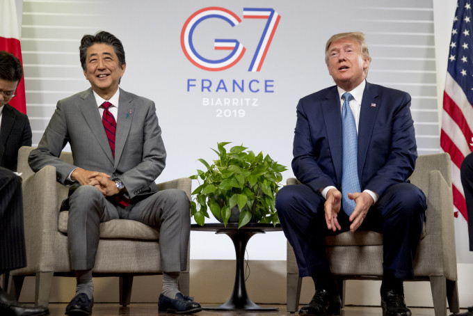 特朗普和安倍于G7已达成原则性贸易协议。AP