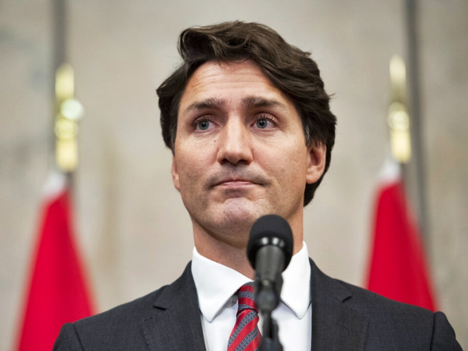 加拿大总理杜鲁多宣布，两名被中国扣押的加拿大公民康明凯及迈克尔斯帕弗已获释。AP图片