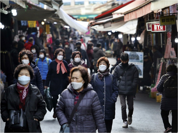 南韓宣布上調防疫級別。AP資料圖片