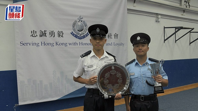 譚鈞鎧督察（左）與吳志霖警員。楊偉亨攝