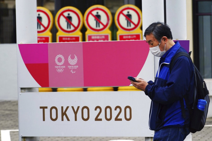 政府购买东京奥运转播权。AP图片