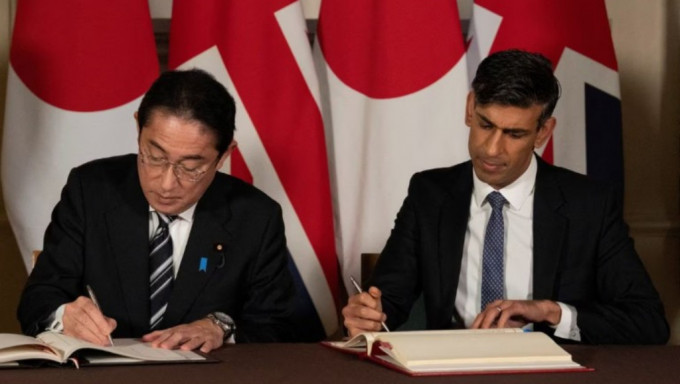 辛偉誠與日本岸田文雄簽署歷史性的《廣島協議》。路透社資料相