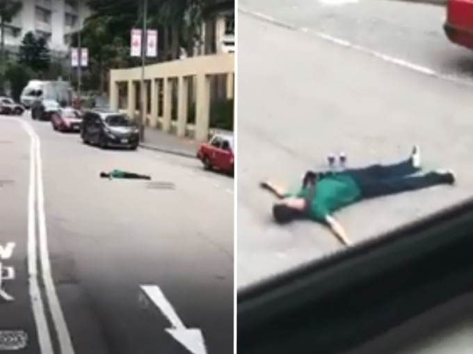 一名男子疑似醉酒後躺在馬路中心。　影片截圖