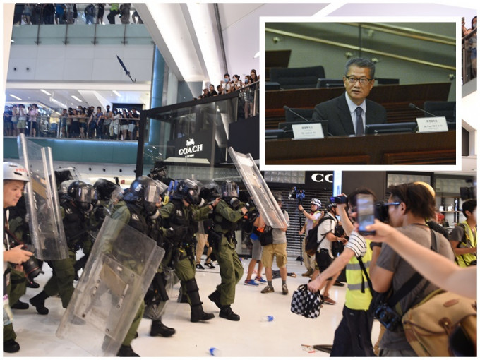 陈茂波（小图）认为暴力场面打击香港国际形象。资料图片