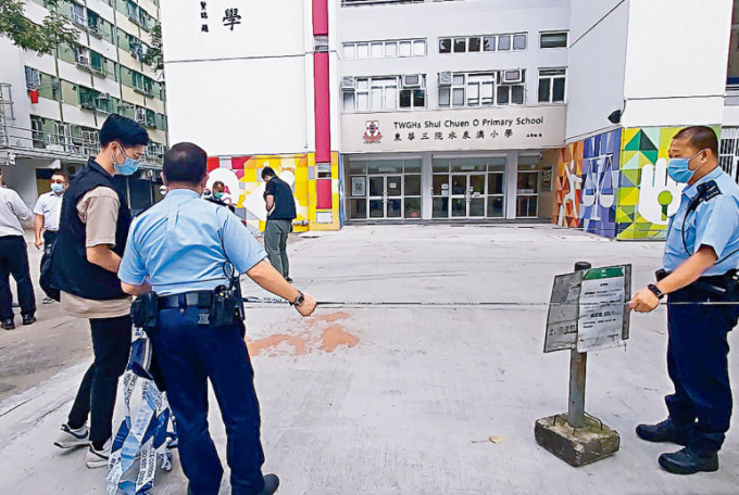 案發後地上遺下橙色漆油。 資料圖片