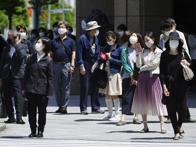 日本东京都新增1050人确诊。AP图片