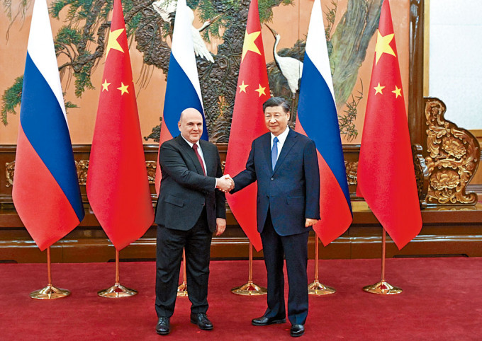 习近平在北京会见俄罗斯总理米舒斯京。