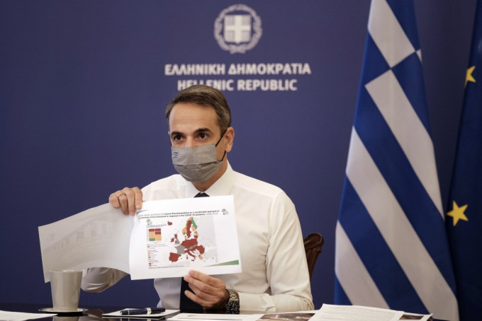 希腊总理米佐塔基斯，宣布将封锁全国。AP图片