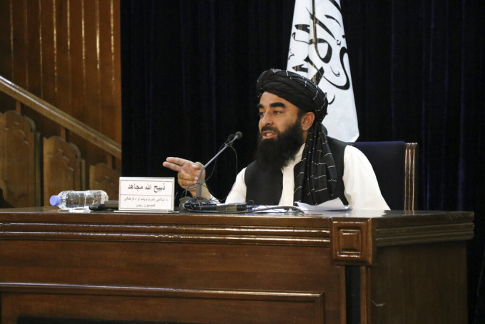 塔利班發言人穆賈希德今日宣布臨時政府的班子。美聯社圖片