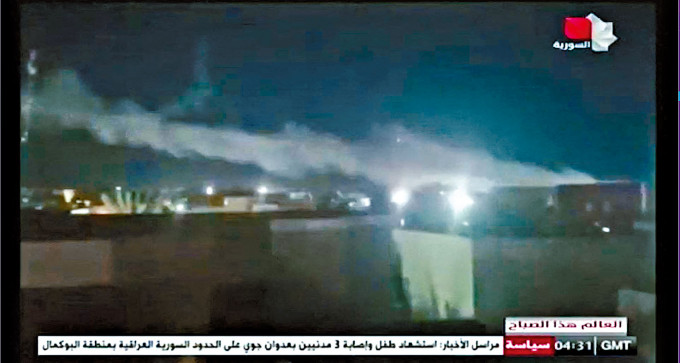 美軍戰機周日晚空襲伊拉克與敍利亞邊境的親伊朗民兵據點，遇襲目標冒煙。