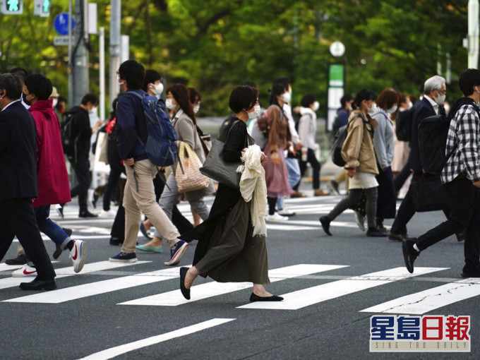 東京都過去6天每日新增逾500宗確診。AP圖片