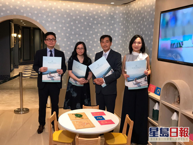 KOKO HILLS今加推80伙,並輕微提價。(圖左二為會德豐黃光耀)