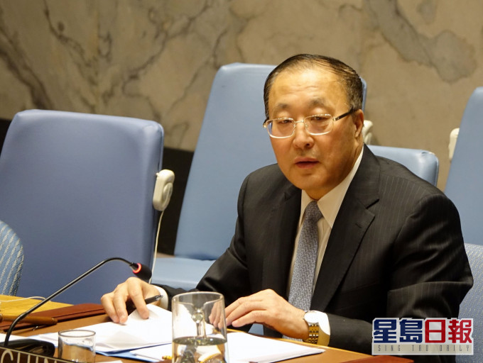 张军呼吁以和平方式解决纷争。新华社