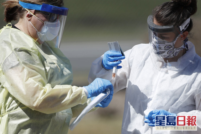 亞當斯警告,疫情將令許多美國人經歷「最苦痛」一周。 AP圖