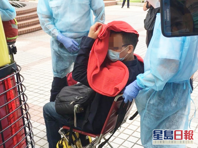 手帶男子。劉曉曦攝