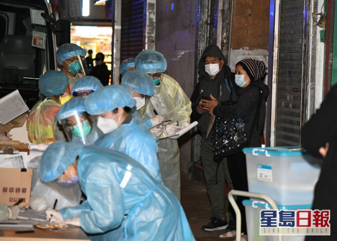 當局安排居民送檢疫中心。 資料圖片
