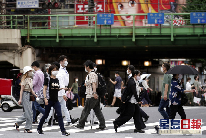 日本新冠肺炎疫情持續升溫。AP