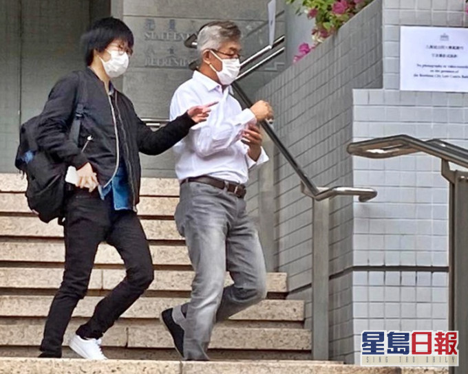 被告梁志安(右)。 資料圖片