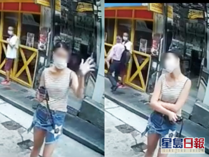 女子站在路旁「霸位」。馬路的事討論區FB影片截圖