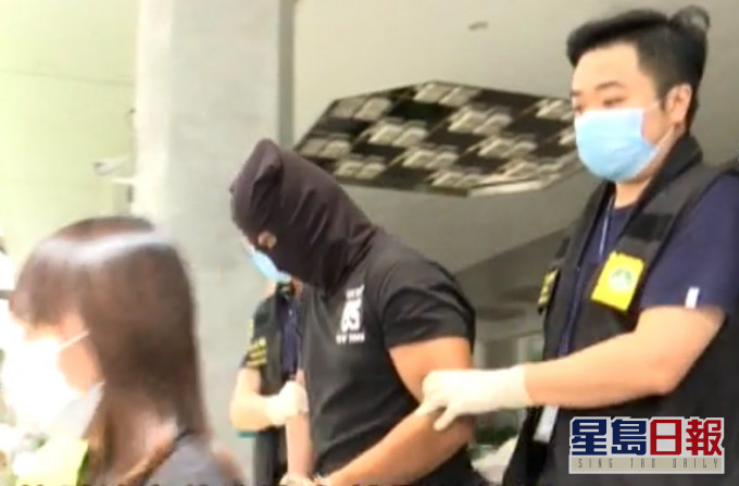 澳门司警拘捕男子。澳广视截图