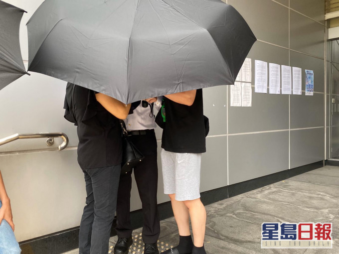 被告陈汉文(中)。 张旭珊摄