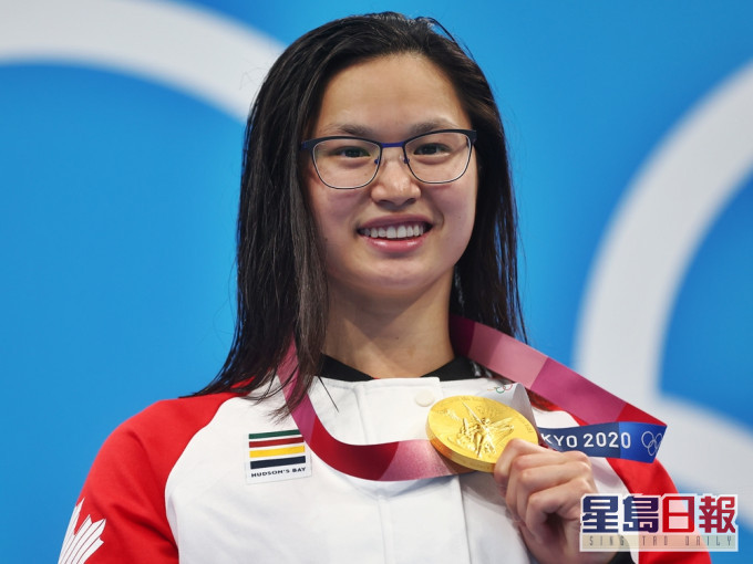 麥妮爾奪得女子100米蝶泳金牌。路透社