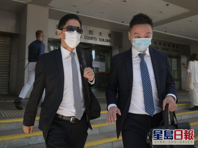 被告龍少泉(左)。