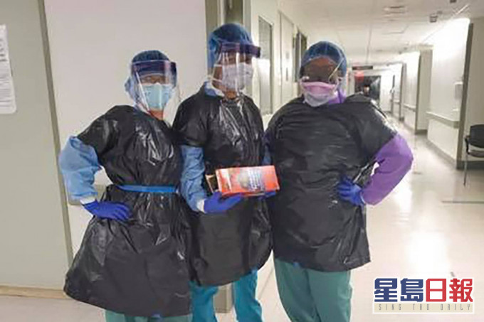 醫護人員將垃圾袋當成臨時防護衣。 網圖