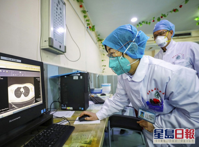 衛健委發布最新的新冠肺炎診療方案。AP