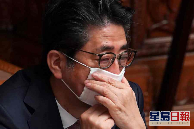安倍晋三对是否颁布紧急状态宣言处于两难。AP