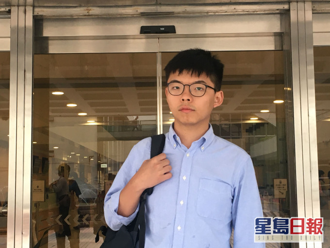 黄之锋被控参与未经批准集结,本月30日东区法院提堂。 资料图片