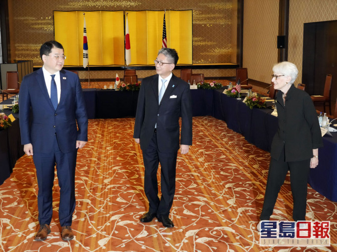 三方將就朝鮮問題、氣候變化和抗疫合作等議題交換意見。AP圖片