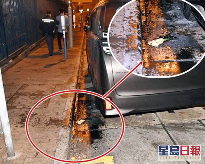 一枚汽油弹跌于街上一辆黑色七人车旁,地上遗下玻璃碎片。