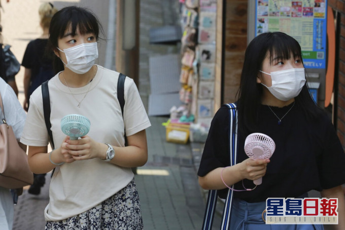 日本疫情持續回升。AP圖片