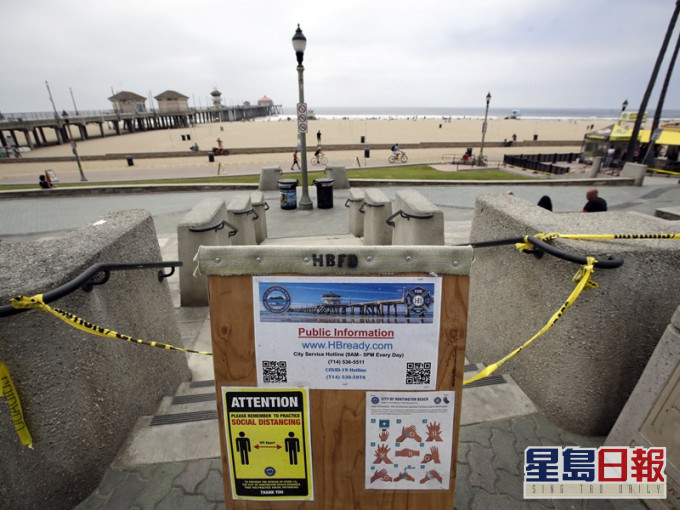 加州州長急急下令封閉南部橙縣各個海灘。AP